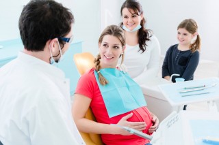 Беременность и имплантация зубов